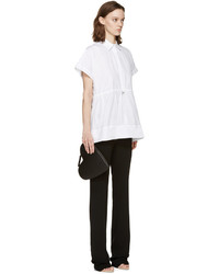 Черный кожаный клатч от Christopher Kane