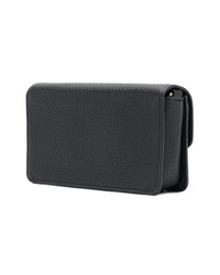 Черный кожаный клатч от Tory Burch