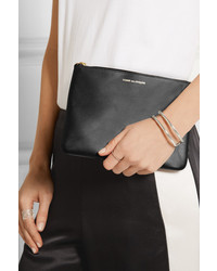 Черный кожаный клатч от Comme des Garcons