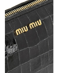 Черный кожаный клатч от Miu Miu