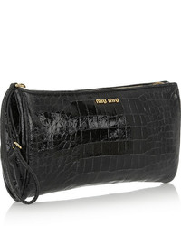 Черный кожаный клатч от Miu Miu