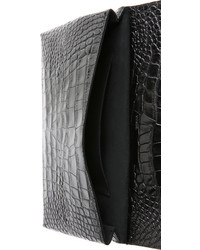 Черный кожаный клатч от Vince