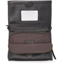 Черный кожаный клатч от Madewell