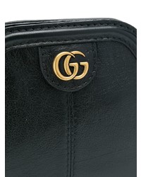 Черный кожаный клатч от Gucci