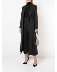 Черный кожаный клатч от Rocio