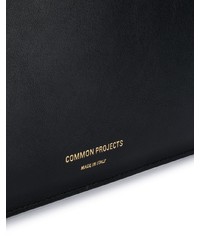 Мужской черный кожаный мужской клатч от Common Projects