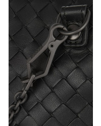 Черный кожаный плетеный клатч от Bottega Veneta