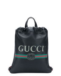 Женский черный кожаный рюкзак с принтом от Gucci