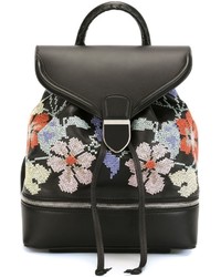 Женский черный кожаный рюкзак с цветочным принтом от Alexander McQueen
