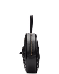Черный кожаный стеганый клатч от Gucci