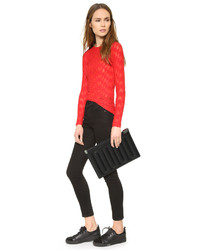 Черный кожаный стеганый клатч от Maison Margiela