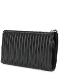 Черный кожаный стеганый клатч от DKNY