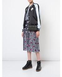 Черный кожаный стеганый клатч от Coach