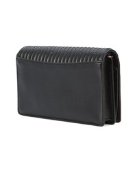 Черный кожаный стеганый клатч от Coach