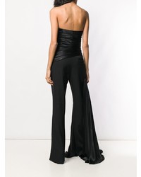 Черный комбинезон с рюшами от Moschino