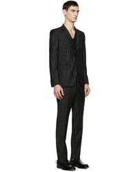 Черный костюм в вертикальную полоску от Givenchy