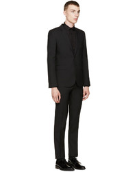 Черный костюм от Saint Laurent