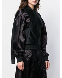 Женский черный плащ от Comme des Garcons