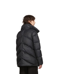 Женский черный пуховик от Canada Goose