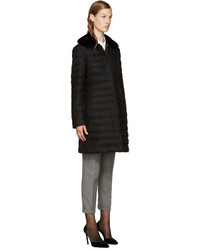 Женский черный пуховик от Moncler Gamme Rouge