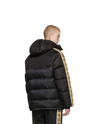 Мужской черный пуховик от Gucci
