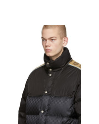 Мужской черный пуховик от Gucci