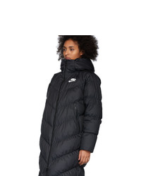 Женский черный пуховик от Nike