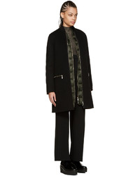 Женский черный пуховик от Moncler Gamme Rouge