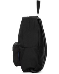 Женский черный рюкзак из плотной ткани от Comme des Garcons