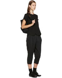 Женский черный рюкзак из плотной ткани от Comme des Garcons