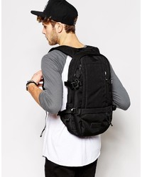 Мужской черный рюкзак из плотной ткани от Eastpak