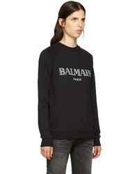 Женский черный свитер от Balmain