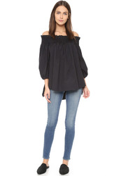 Черный топ с открытыми плечами от Caroline Constas