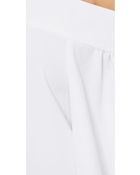 Черный топ с открытыми плечами от Tibi