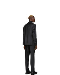 Черный шерстяной костюм в вертикальную полоску от Hugo