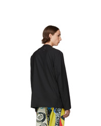 Мужской черный шерстяной пиджак от Maison Margiela