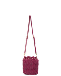 Ярко-розовая бархатная стеганая сумка-мешок от Miu Miu