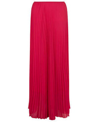 Ярко-розовая длинная юбка со складками