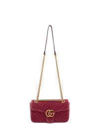 Ярко-розовая замшевая стеганая сумка-саквояж от Gucci