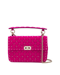 Ярко-розовая замшевая сумка через плечо от Valentino