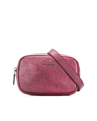 Ярко-розовая кожаная поясная сумка от Coach