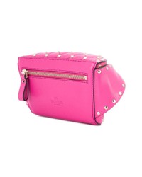 Ярко-розовая кожаная поясная сумка от Valentino