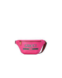 Ярко-розовая кожаная поясная сумка от Gucci