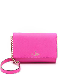 Женская ярко-розовая кожаная сумка от Kate Spade