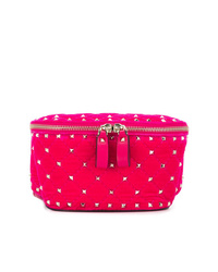 Ярко-розовая поясная сумка от Valentino