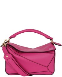 Ярко-розовая сумка с геометрическим рисунком