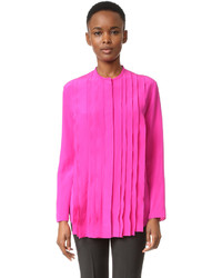 Ярко-розовая шелковая блузка от Nina Ricci