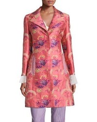 Ярко-розовое пальто с цветочным принтом