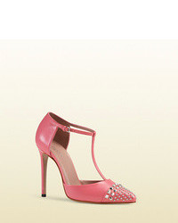 Ярко-розовые кожаные туфли с шипами
