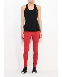 Ярко-розовые леггинсы от Nike